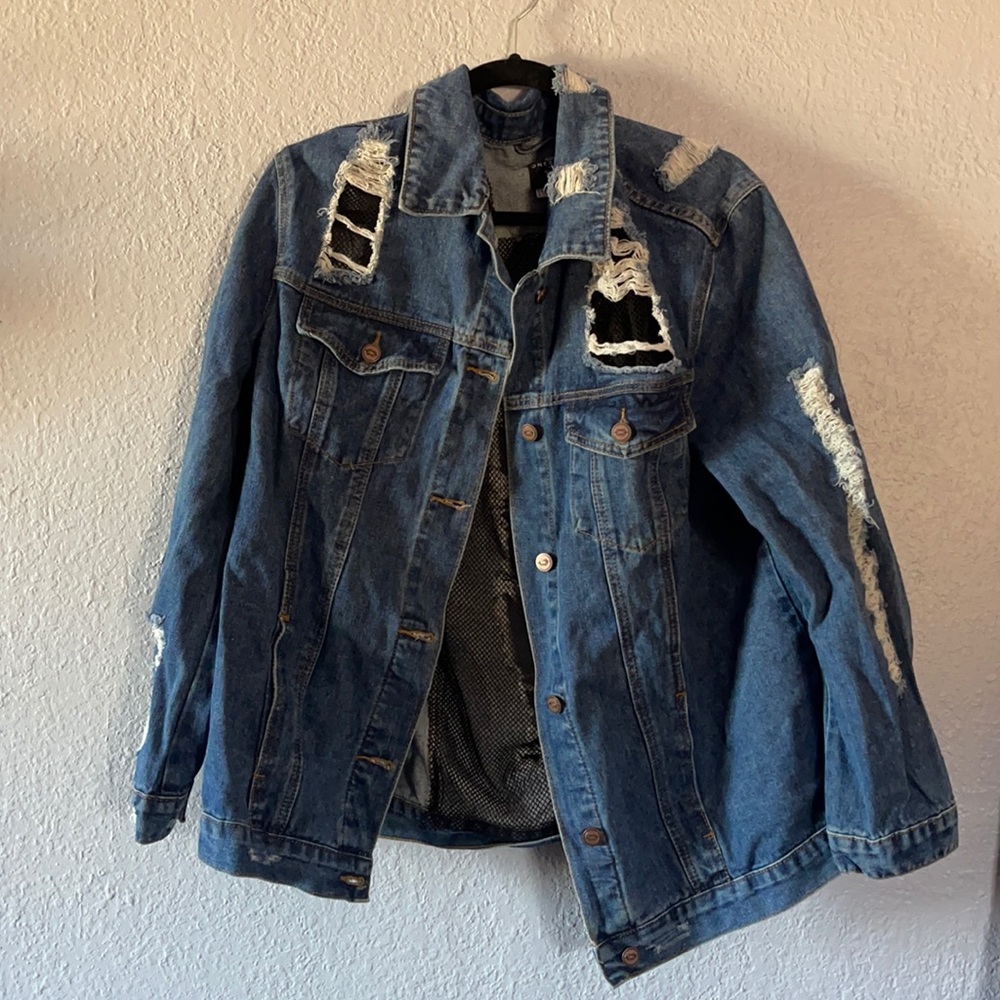 Distressed denim jacket